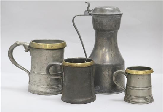 An 18th century Scottish pewter tappit hen and three pewter, brass rimmed tankards, in sizes